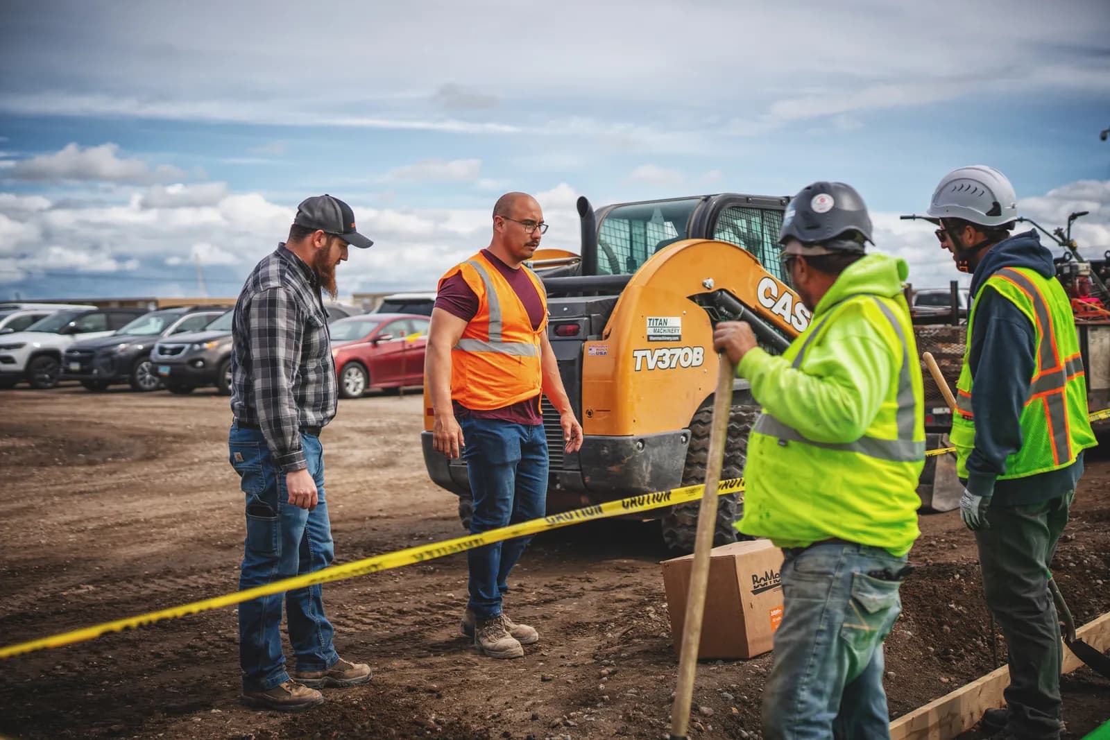 High-visibility field crew coordinating work on an active jobsite