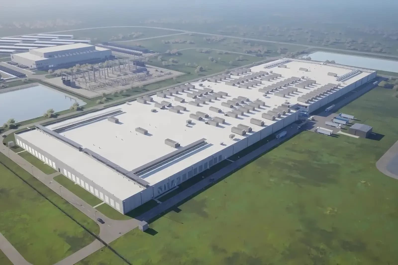 Aerial view of a large-scale data center campus with substation
